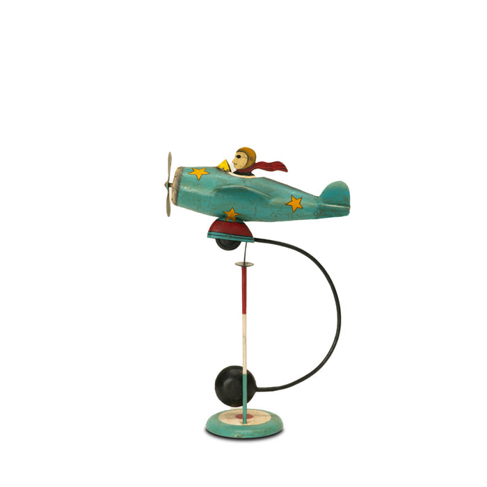 A hand-painted, bronze-colored model of a 19th century flying machine with a figure of a 'Flying Ace' on top.