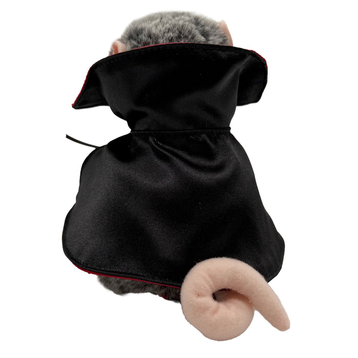 Plush toy possum in a vampire costume with red cape and black outfit on a white background