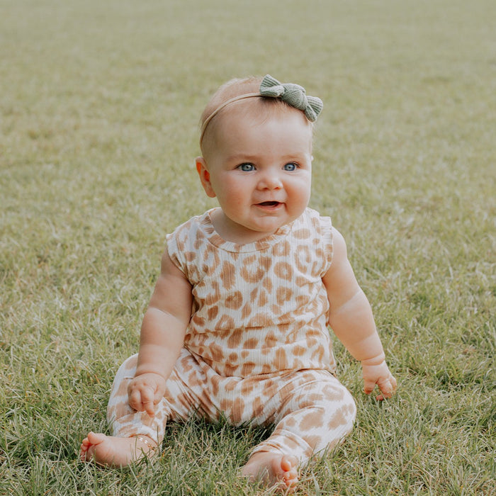Baby wearing Taupe Cream Rib Harem Romper