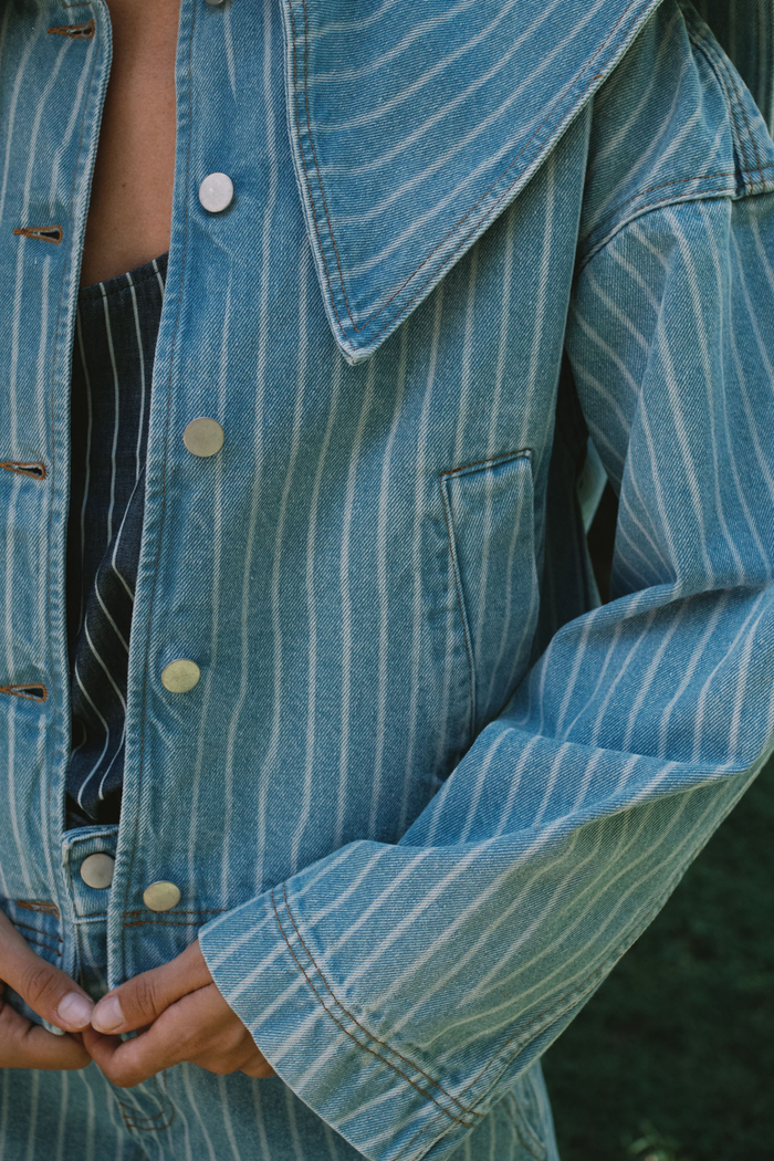 Tiny Big Sister striped cotton jacket with collar and relaxed fit. A stylish, lightweight layer for spring and summer. Shop at Dotique.