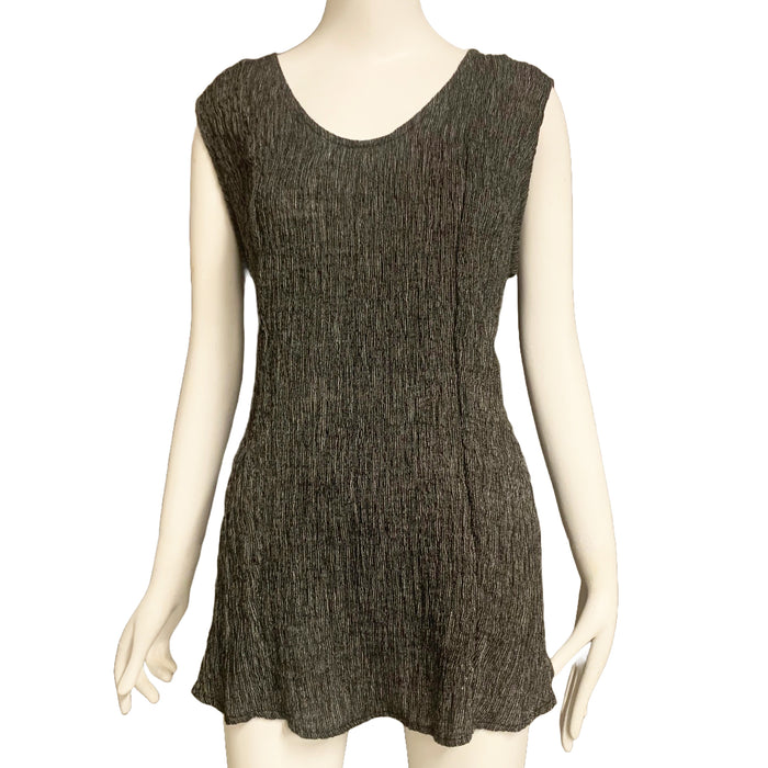 Sleeveless top in crinkled black and white pinstripes, displayed on a mannequin.