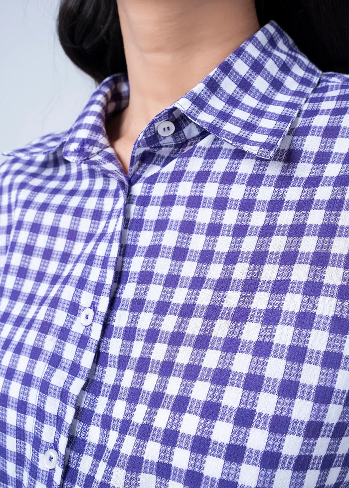 Purple-and-white check woven top close-up: button placket and collared neckline