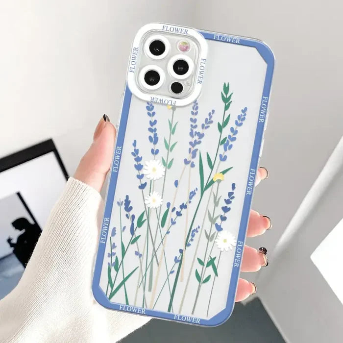a woman holding a phone case with a flower design
