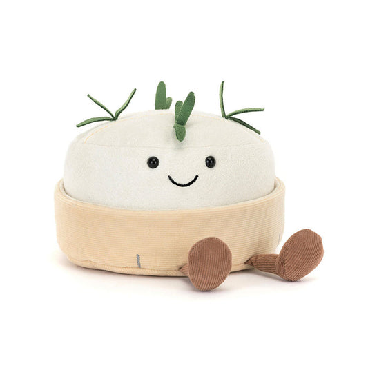 Plush toy wheel of cheese with a smiling face on a white background