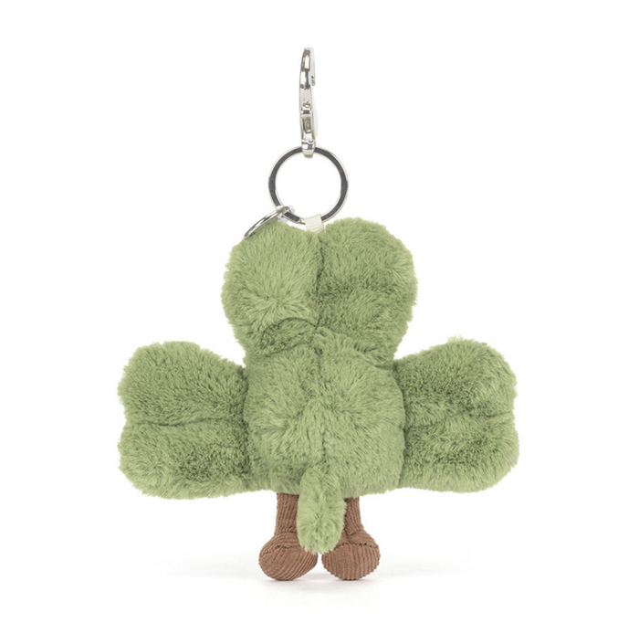 Green plush keychain shaped like a clover with a keyring on a white background