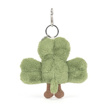 Green plush keychain shaped like a clover with a keyring on a white background