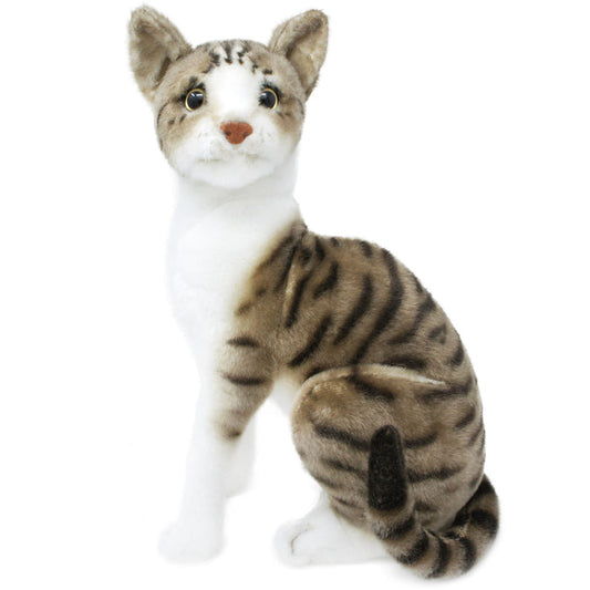 A plush toy resembling an American Shorthair cat with a mackerel tabby coat, featuring a realistic design with stripes, seated upright, with a focus on its face and detailed features.
