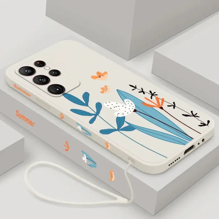 a phone case with a bird and flowers on it
