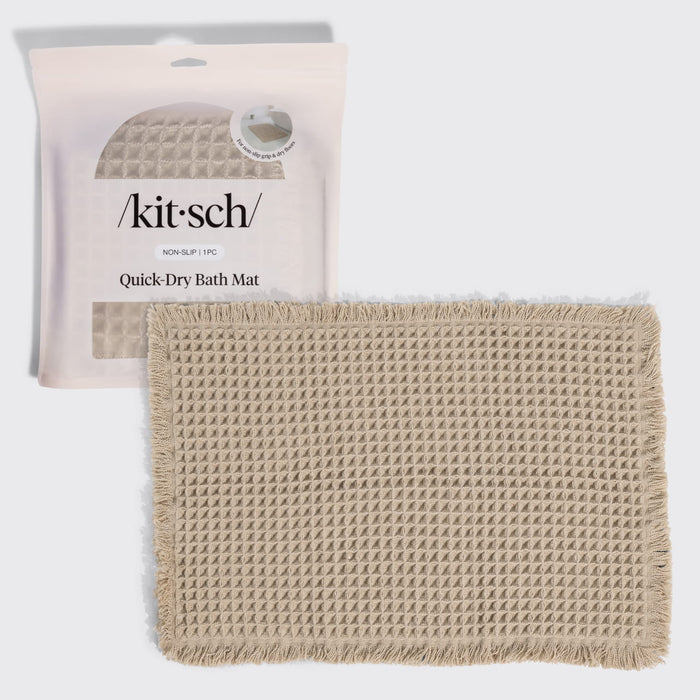 KITSCH Camel Quick-Dry Bath Mat — hero shot of the folded waffle-knit mat with its retail packaging — Plush waffle texture creates a soft, cushioned feel underfoot — an everyday luxury for your bathroom floor