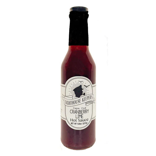 Bottle of red sauce with label the reads ' Lighthouse Keepers Cape Cod Cranberry Lime Hot Sauce'