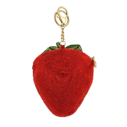 Red strawberry-shaped keychain with gold clasp on a white background