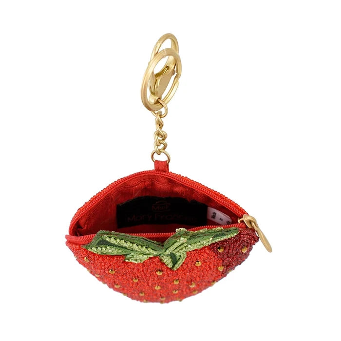 Strawberry-shaped keychain pouch with gold zipper on a white background
