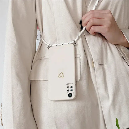 a woman holding a cell phone case
