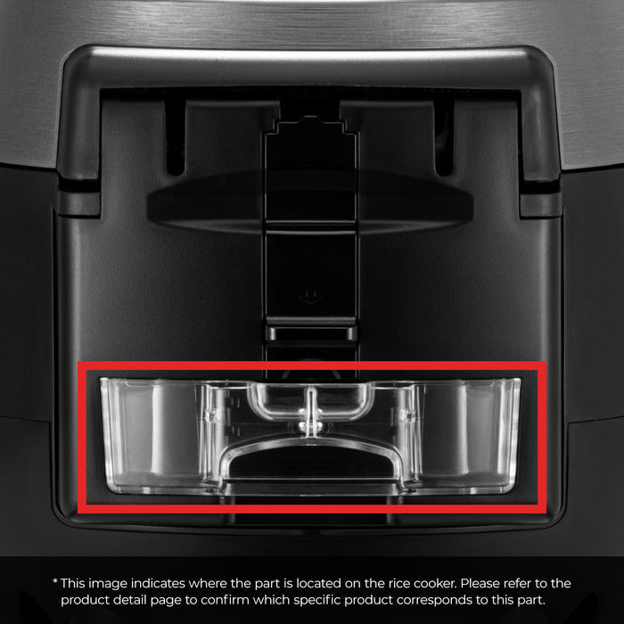 Clear plastic drain dish highlighted in red on a Cuckoo rice cooker to show its installation location.