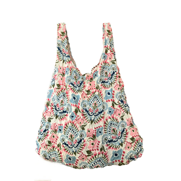 Floral patterned reusable bag on a white background