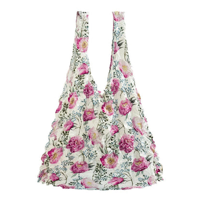 Floral patterned bag on a white background