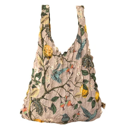 Reusable bag with floral and nature-themed design on a white background