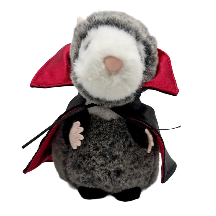 Plush toy possum in a vampire costume with red cape and black outfit on a white background