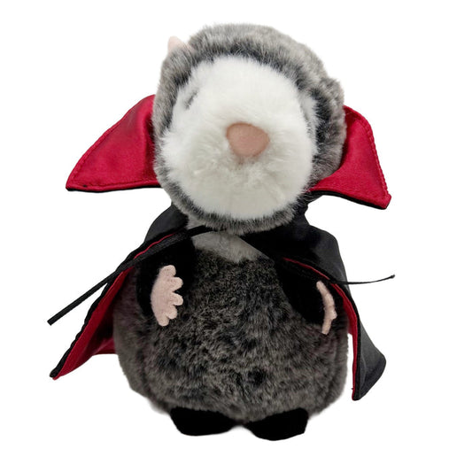 Plush toy possum in a vampire costume with red cape and black outfit on a white background