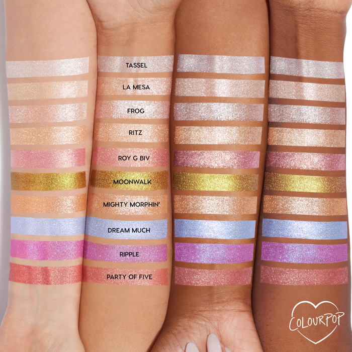 La Mesa ColourPop Super Shock Shadow swatched as a sheer champagne-beige shimmer across three arms in a lineup of labeled shades, showing its luminous, glittery finish and how the color reads on multiple skin tones.