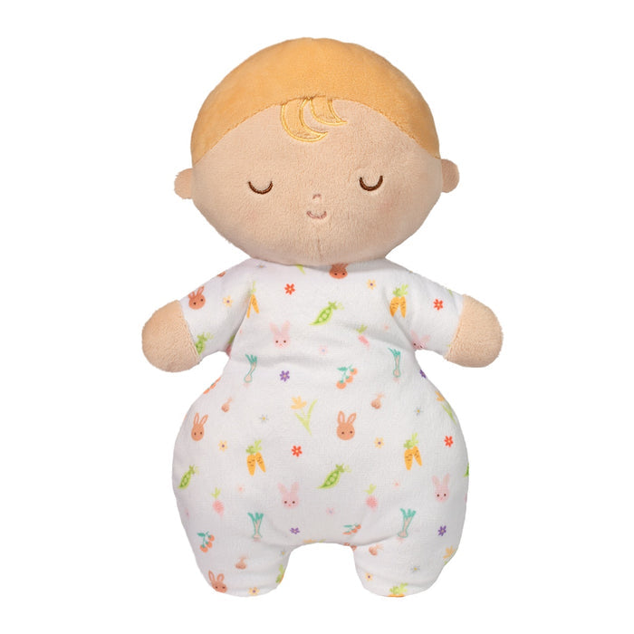 Plush toy baby doll with blonde hair and a patterned outfit on a white background