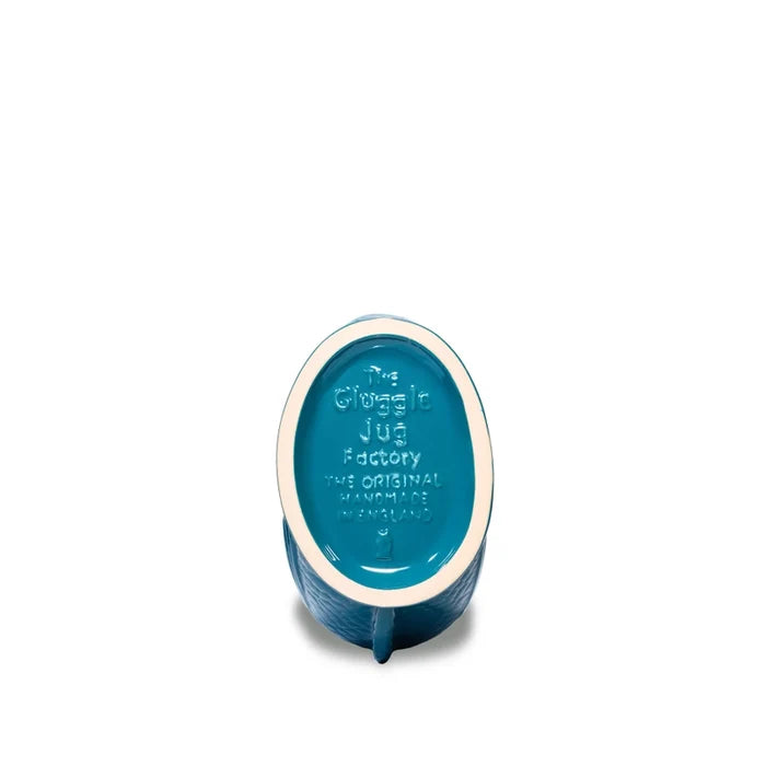 Blue ceramic product with 'The Gluggle Jug Factory' branding on a white background
