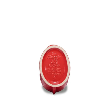 Red ceramic product with 'The Gluggie Jug Factory' branding on a white background