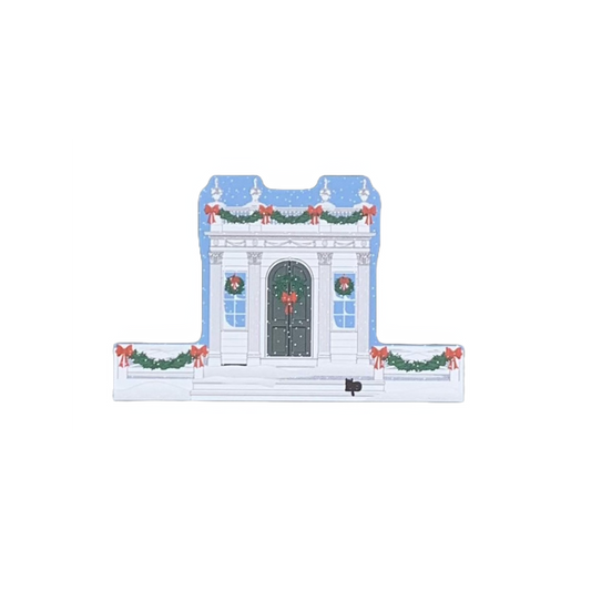 Decorative wood block of the Derby-Beebe Summer House decorated for the holidays.