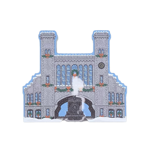 A decorative block featuring a historical train station design with Christmas decorations.