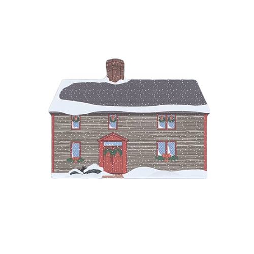 A decorative block featuring the Samuel Pickman House, depicted with a snowy roof and a red front door, against a white background.