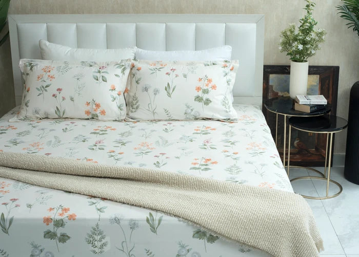 Cotton cream floral bed sheet set with pillowcases and textured cover detail