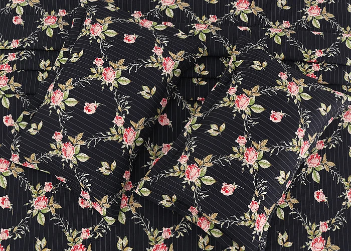 Black cotton pillow cover fabric with floral vine print and fine pinstripe texture