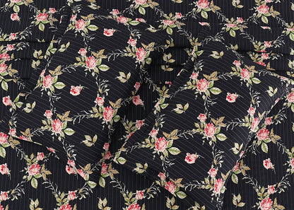 Black cotton pillow cover fabric with floral vine print and fine pinstripe texture