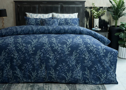 Navy Lucent cotton comforter set with botanical print, matching shams and pillows
