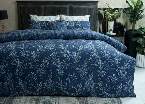 Navy Lucent cotton comforter set with botanical print, matching shams and pillows