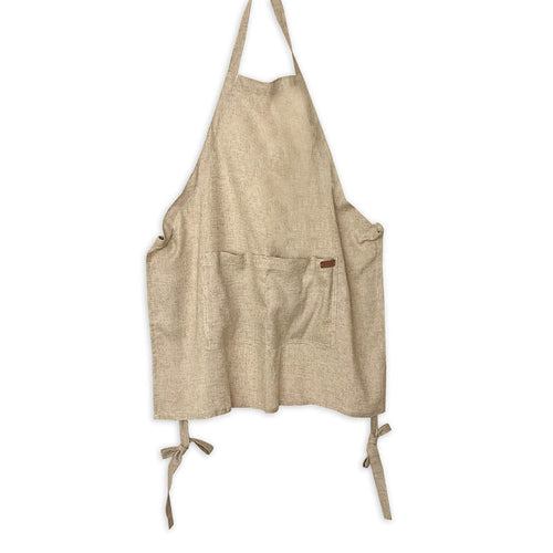 Linen apron in natural tan tones.