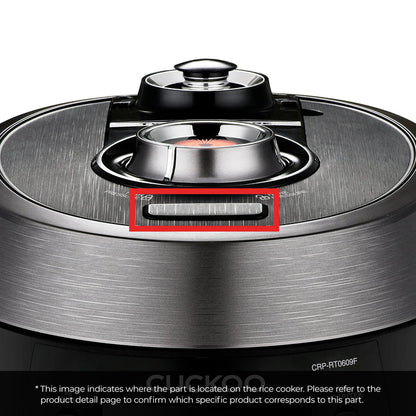 Close-up of a Cuckoo rice cooker lid with a red rectangular frame highlighting the specific part location.