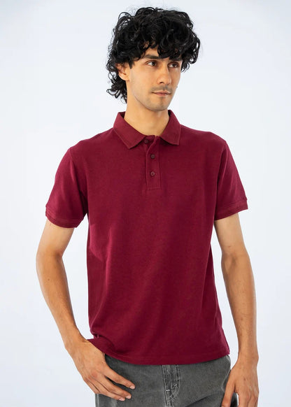 Maroon men's polo shirt close-up: short sleeves, button placket, ribbed collar