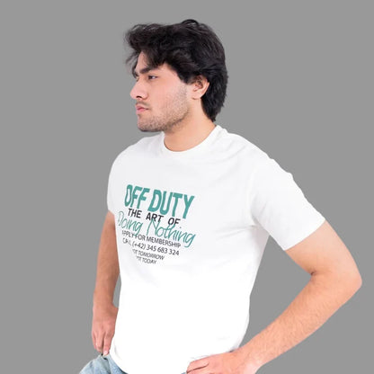 Men's off-white winter T-shirt with green “OFF DUTY” graphic, side pose