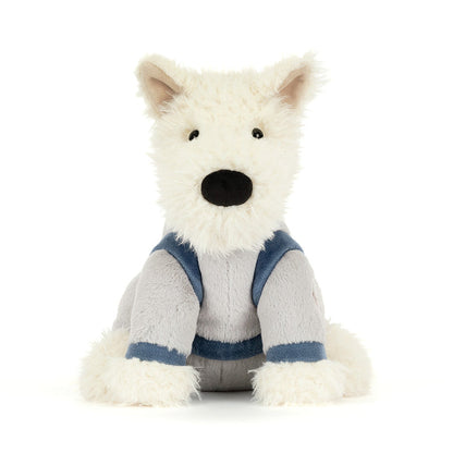 White plush dog with a blue space suit on a white background
