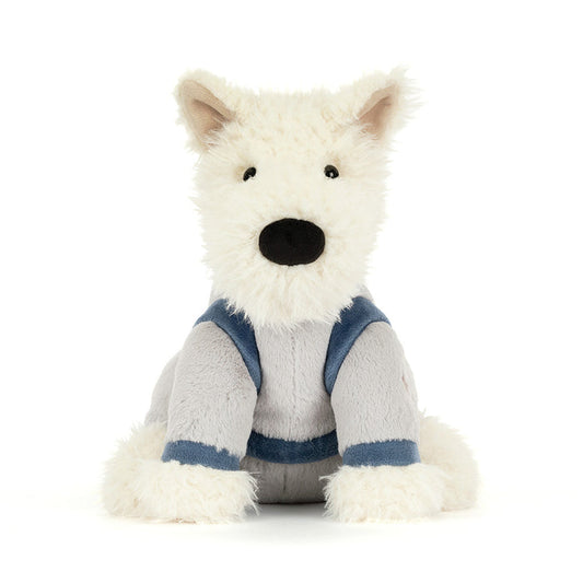 White plush dog with a blue space suit on a white background