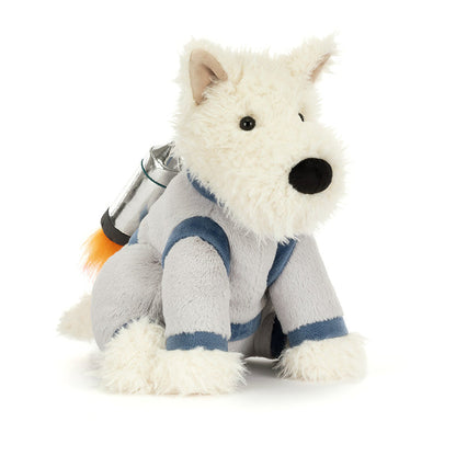 Plush toy dog in a space suit with a jet-pack on a white background