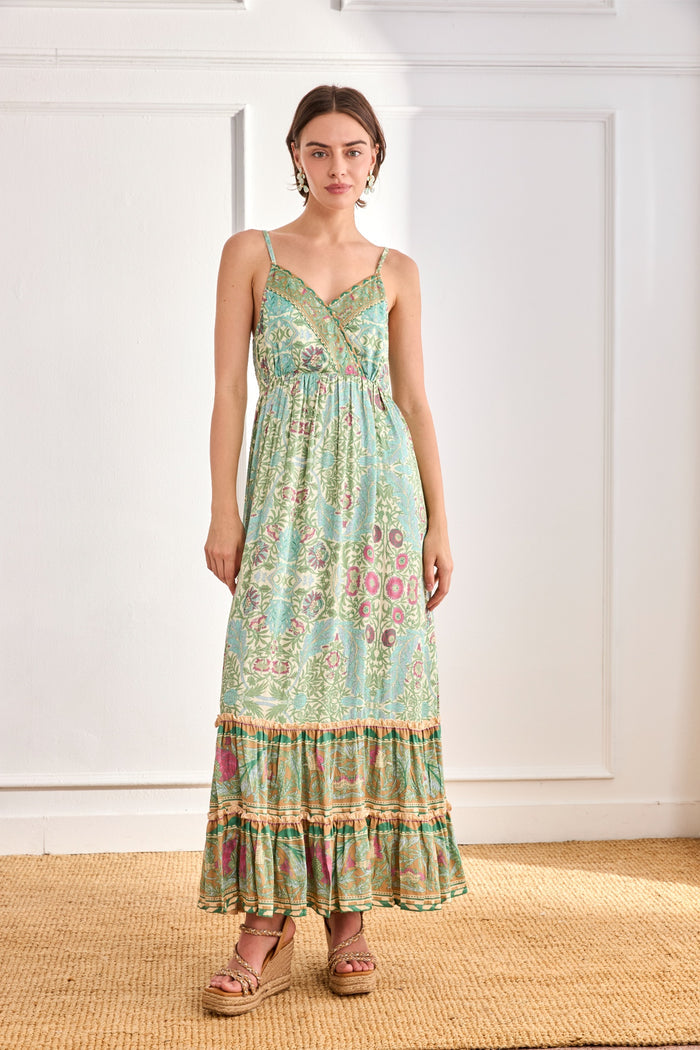 Model wearing NKN Nekane Jomi  Aqua Long Viscose Dress with Botanical Print by nkn nekane, shop nkn nekane at Dotique