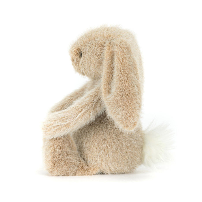 Plush bunny toy on a white background