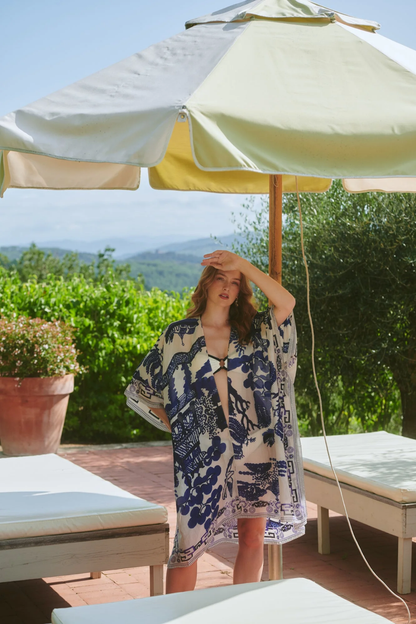 Giant Willow Blue & White throwover by One Hundred Stars in a premium modal-cupro blend. Lightweight, fluid and perfect for layering over dresses or tops. Shop at Dotique.