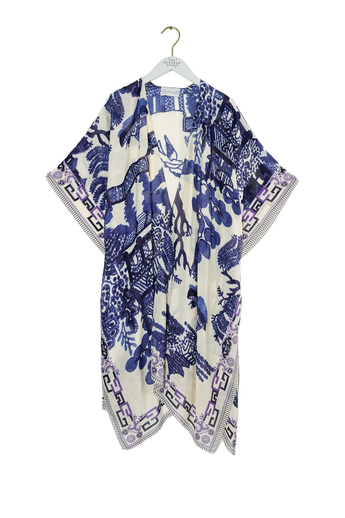 Giant Willow Blue & White throwover by One Hundred Stars in a premium modal-cupro blend. Lightweight, fluid and perfect for layering over dresses or tops. Shop at Dotique.