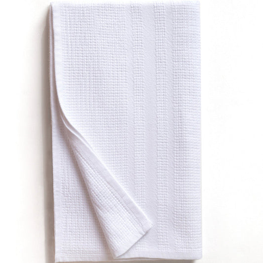 White textured towel on a white background