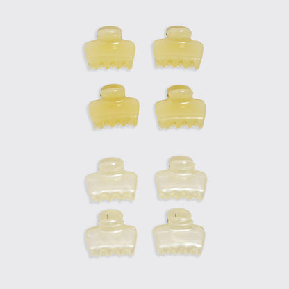 KITSCH Pearlized Cream & Butter Yellow Jelly Cloud Clips Mini — flat lay grid showing all 8 clips in 4 rows of 2 on white background — butter yellow clips top half, pearlized cream clips bottom half — All-Day Hold | 8pcs, Made from Recycled Materials — mini jelly claw clip color comparison shot
