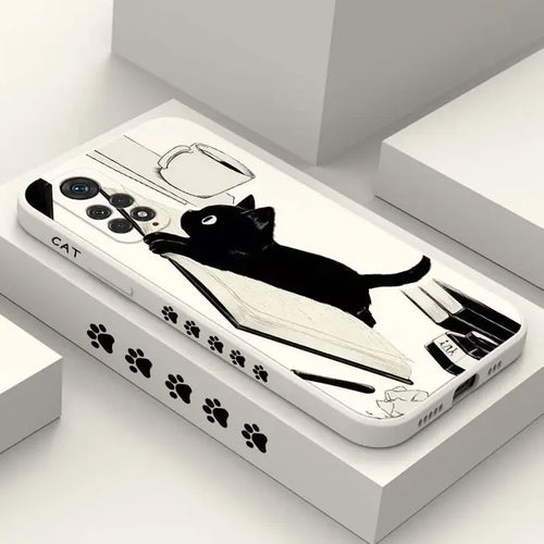 a phone case with a black cat on it