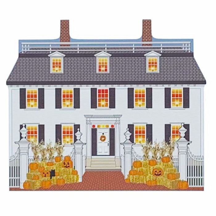 A miniature replica of the Ropes Mansion from the Hocus Pocus movie, featuring the house with pumpkin decorations in front.